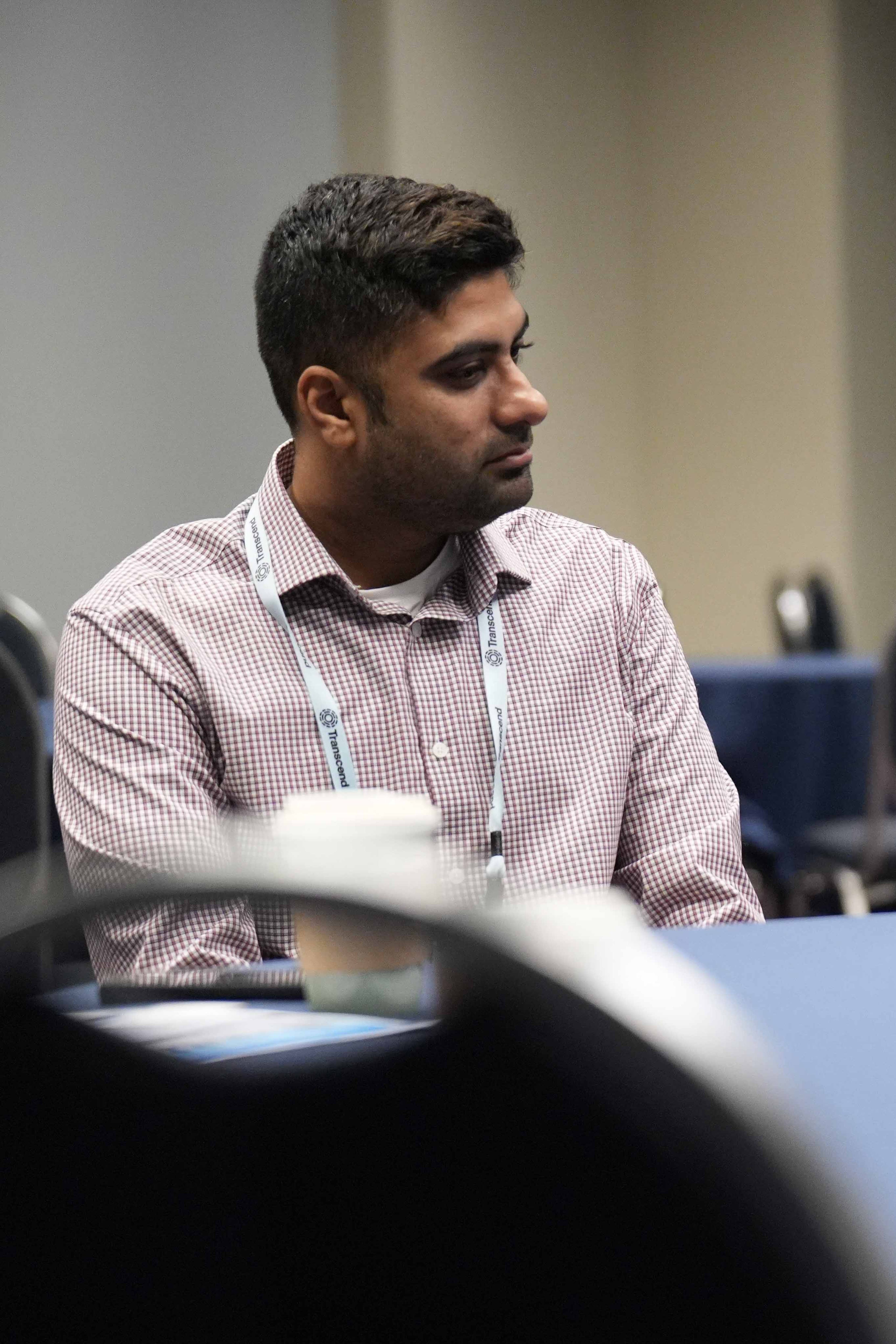 A man listening to someone at a Privacy Engineering section meetup