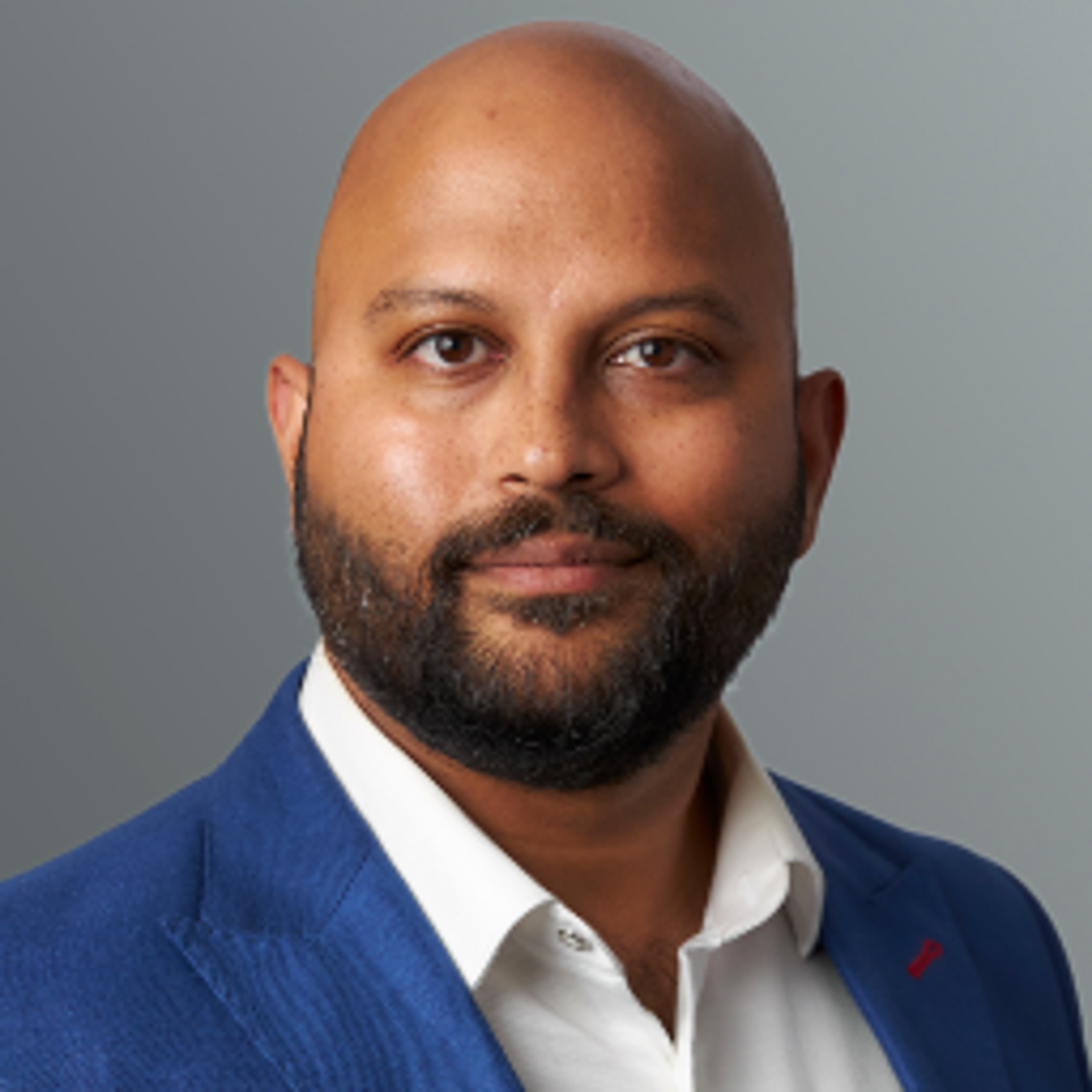 headshot of Tim de Sousa