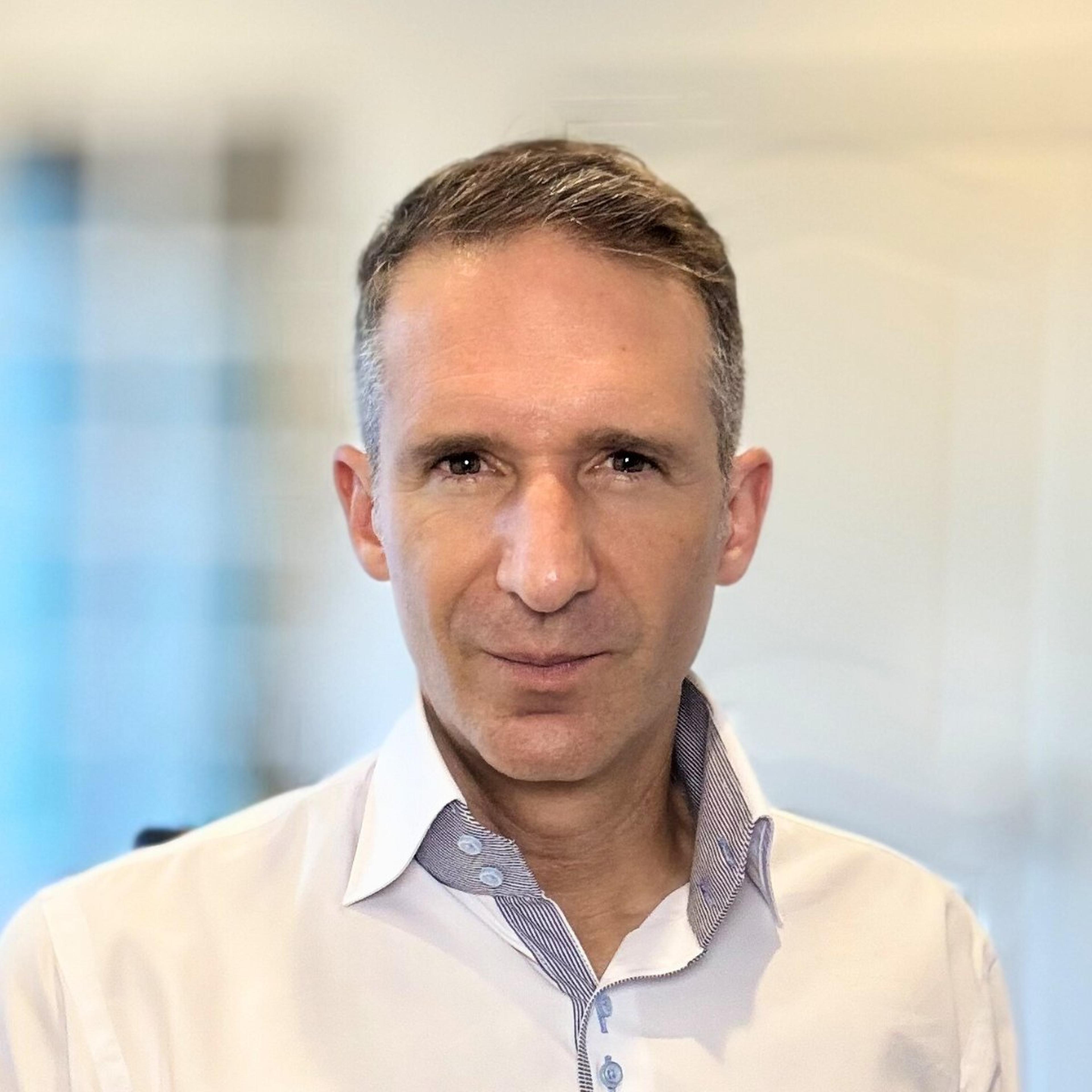 headshot of Damien Kopp