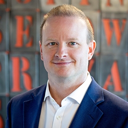 headshot of Mark Thompson