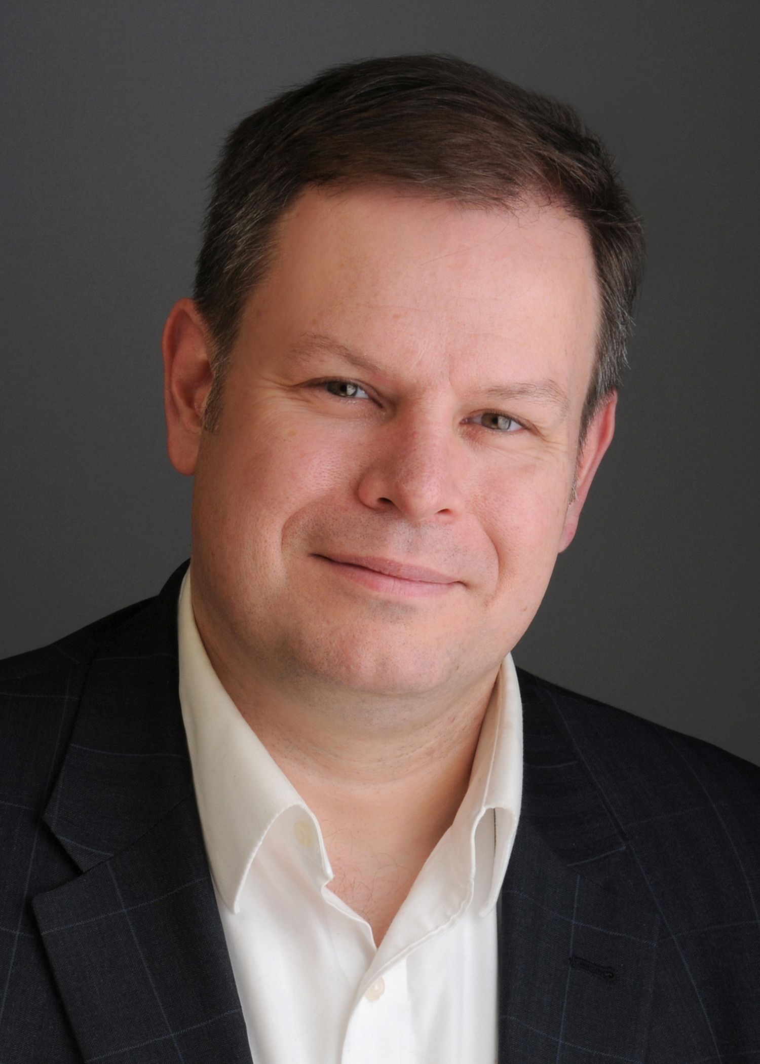 headshot of Michael Maguire