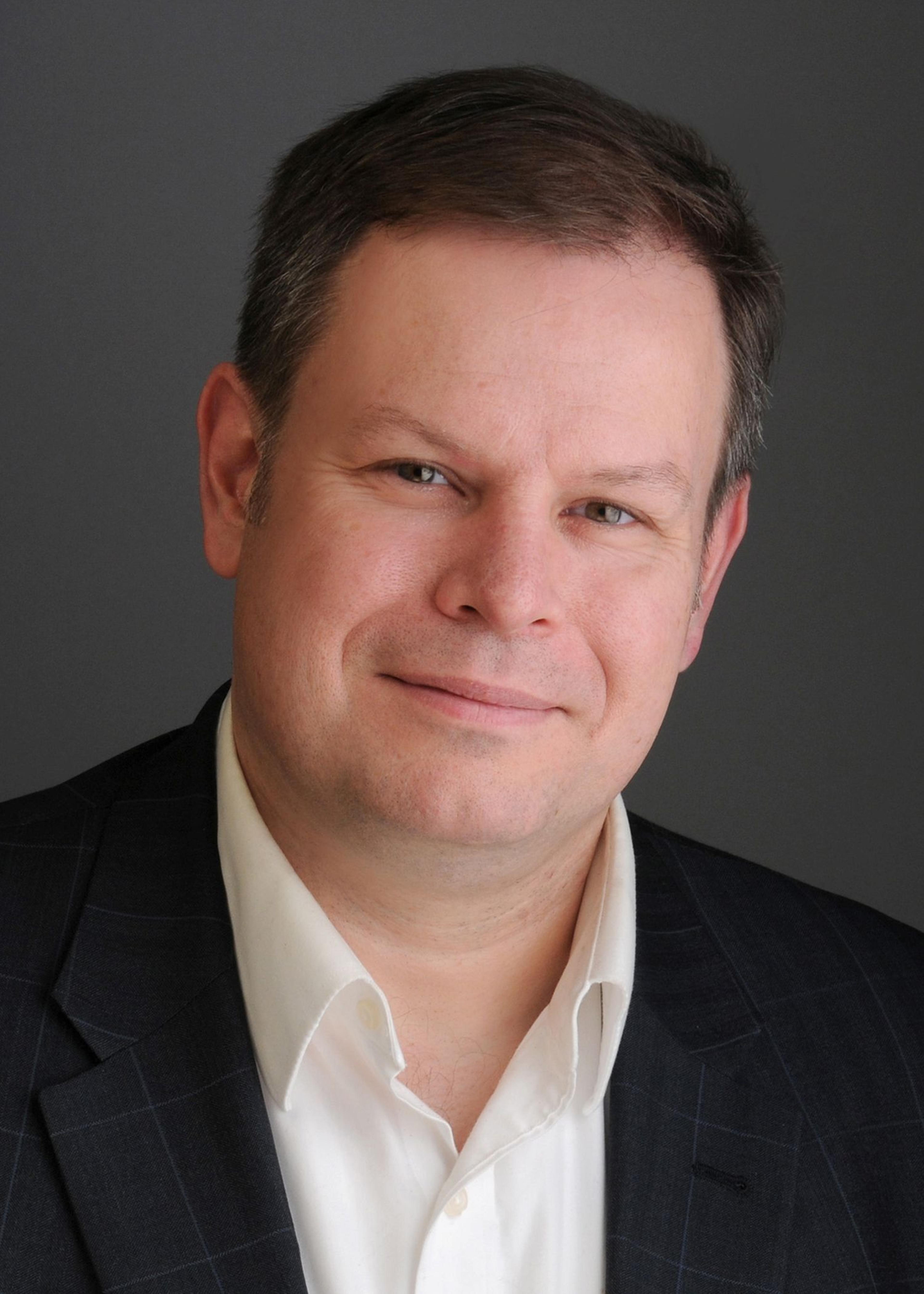 headshot of Michael Maguire