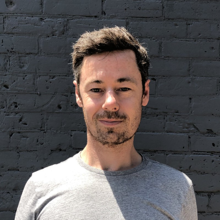 headshot of André Côté