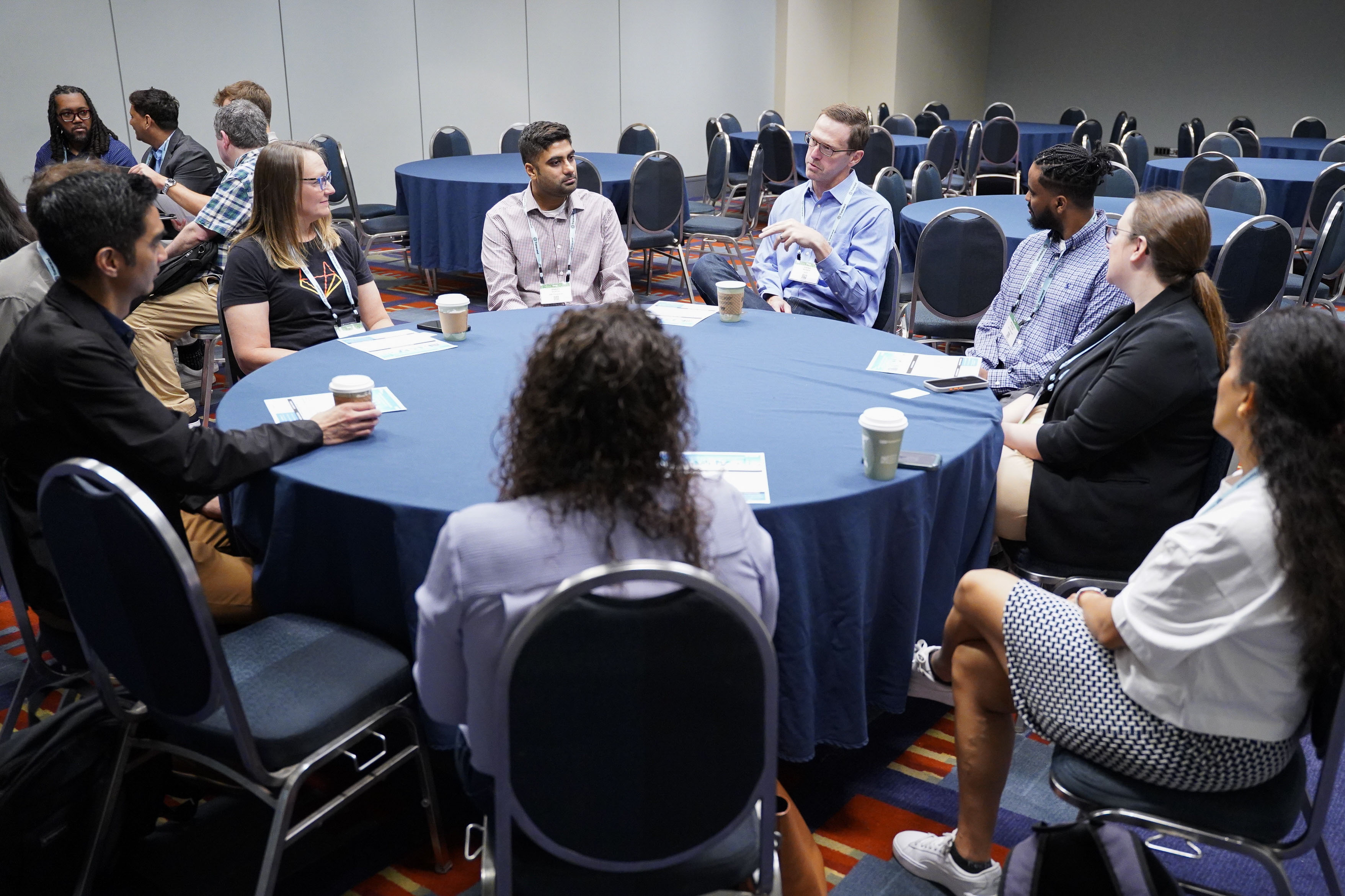A group of people talking at a Privacy Engineering meetup