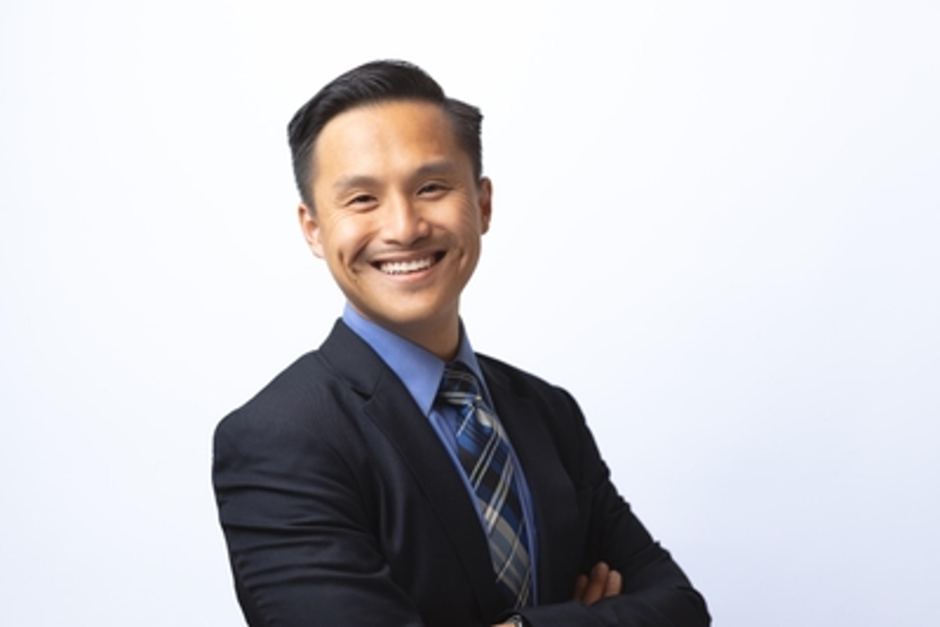 headshot of John Tao