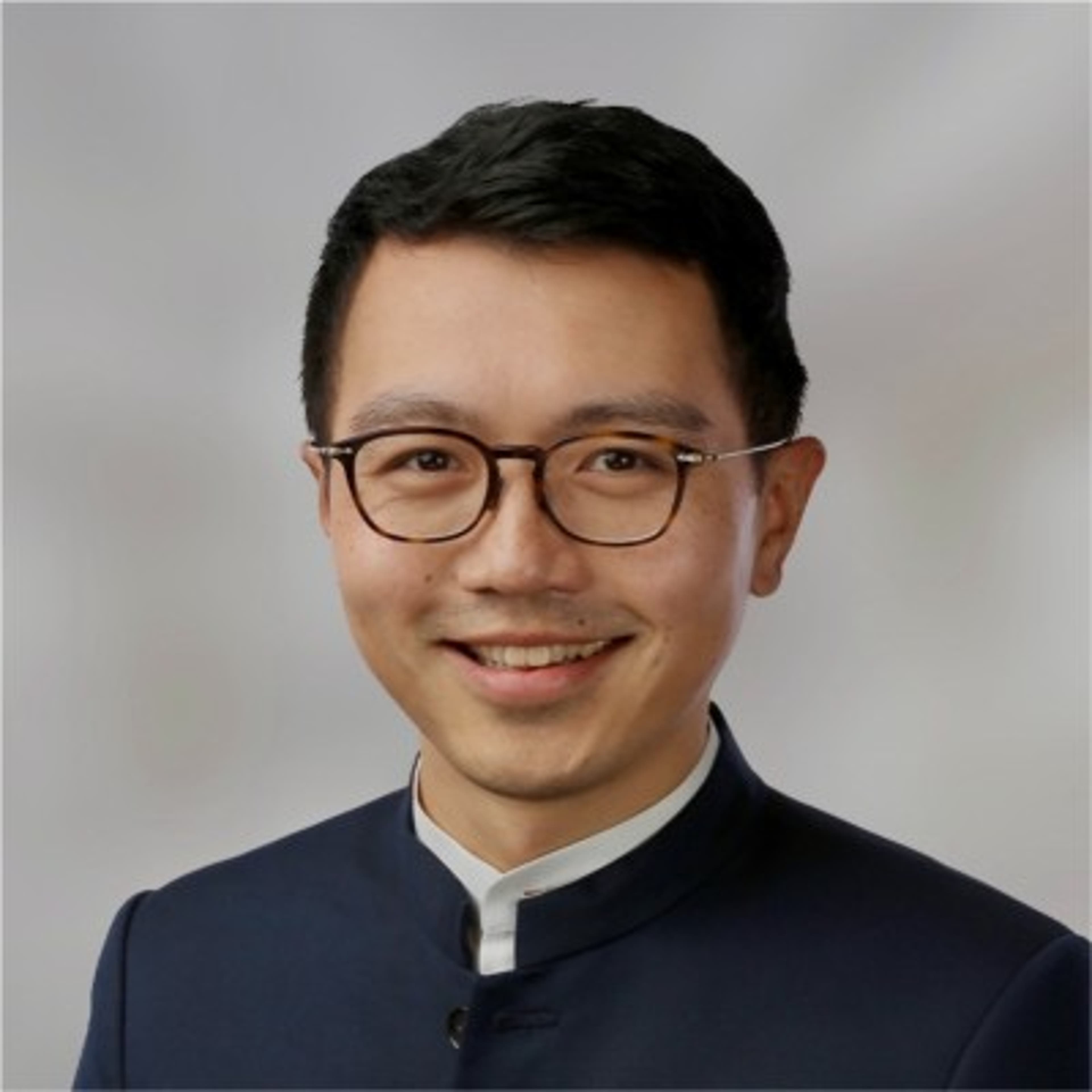 headshot of Oscar Tang