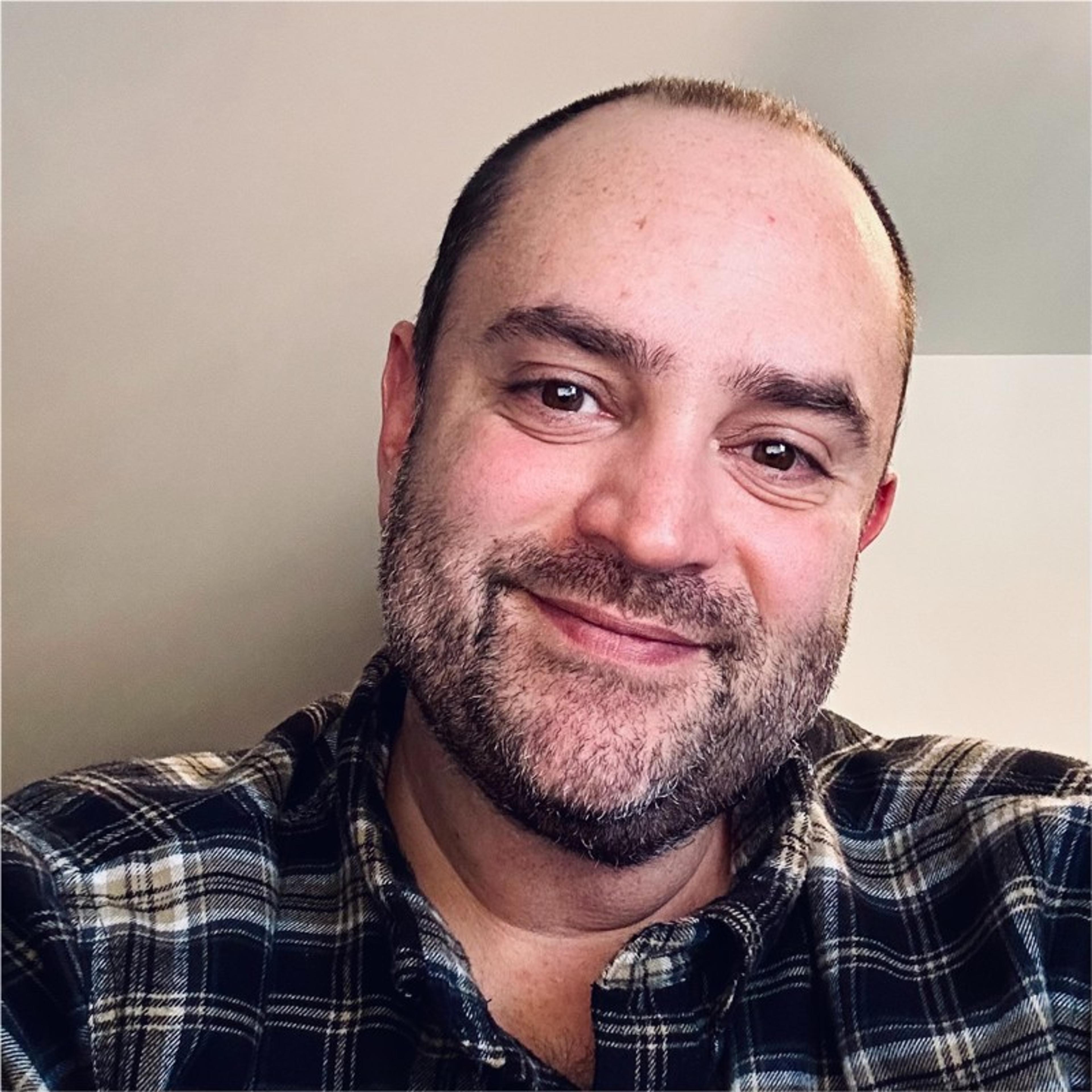 headshot of Andrew Dale