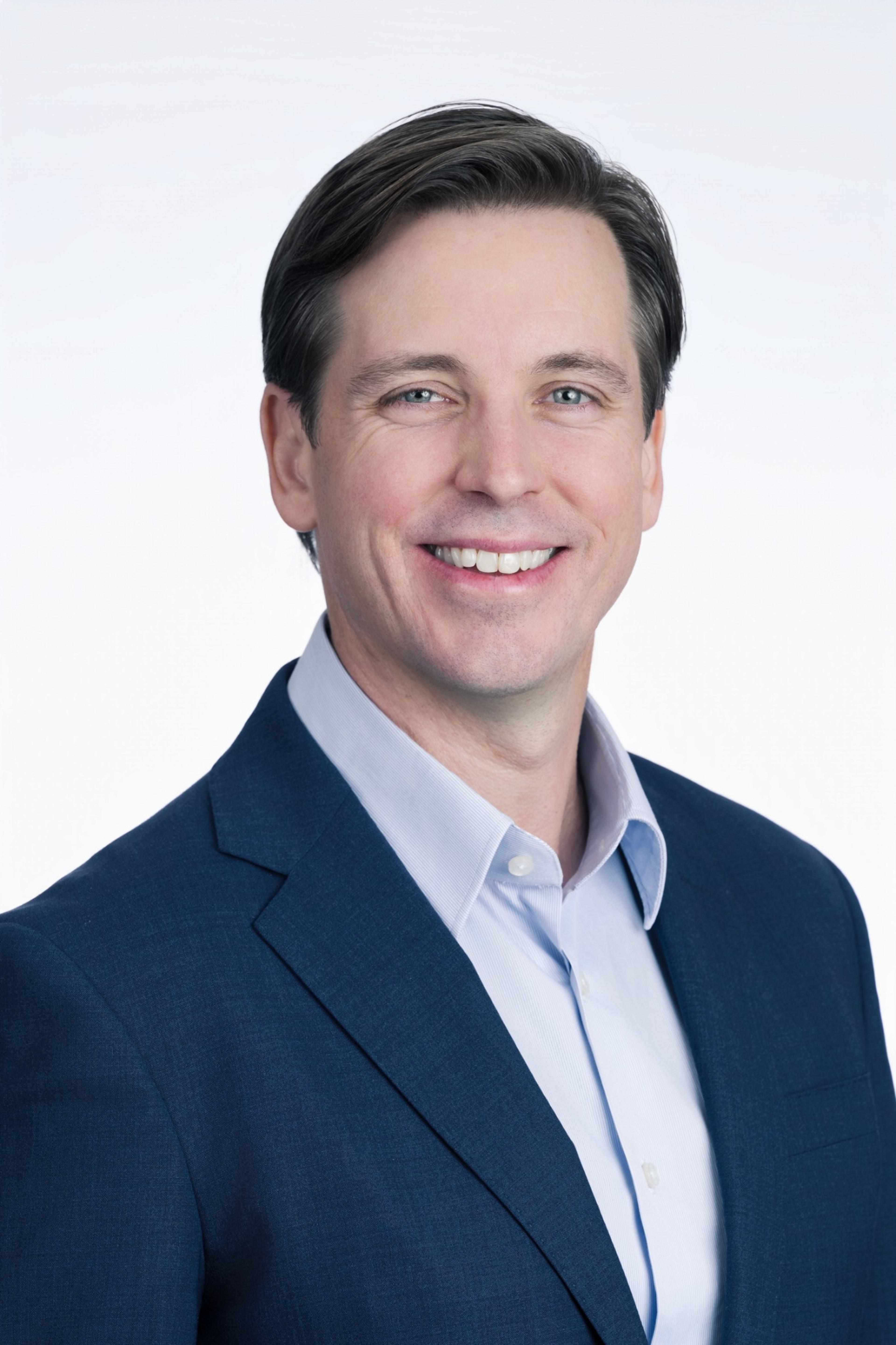 headshot of Adrian Fisher