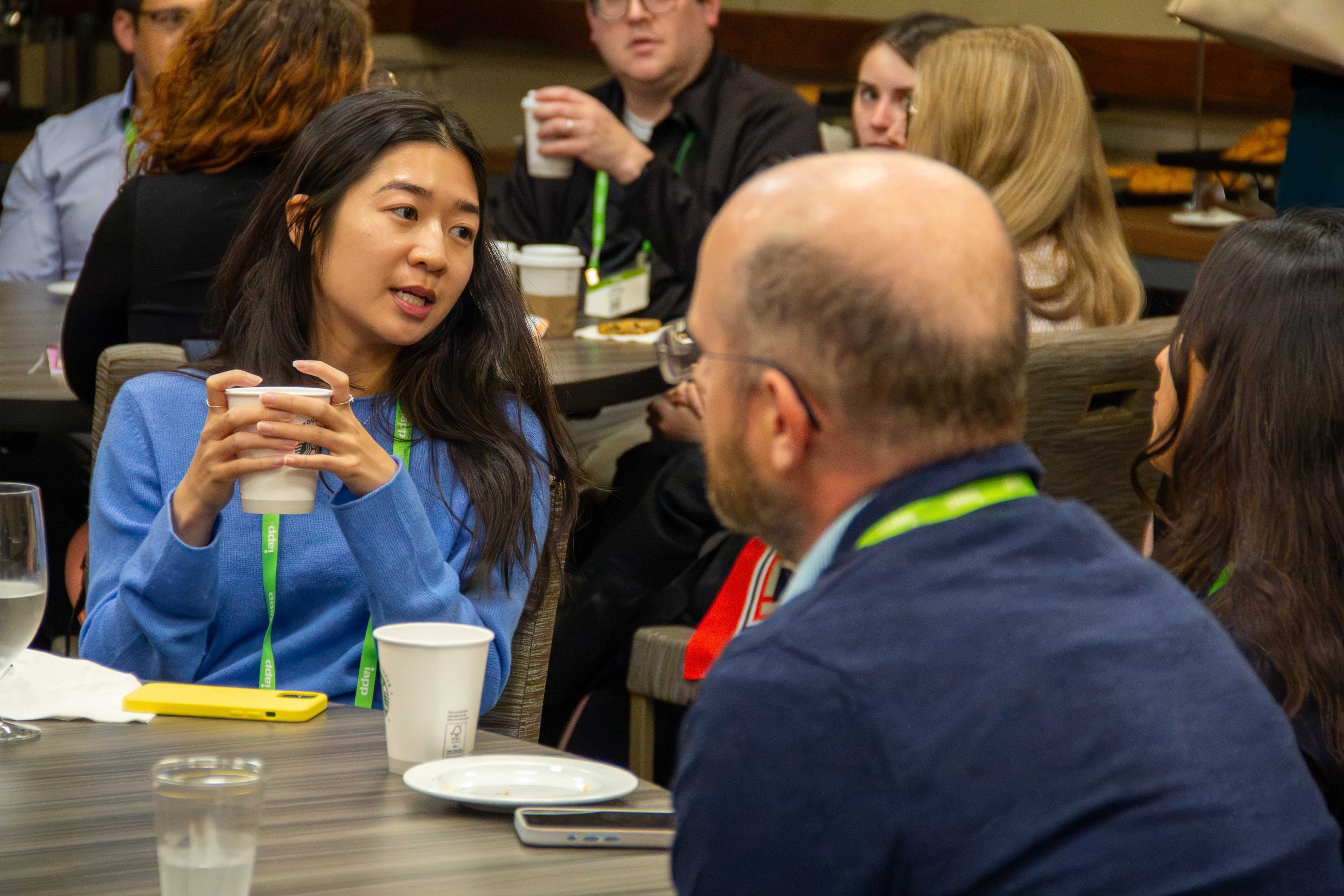 A man and a woman talking at a Privacy Bar section meetup