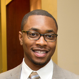 headshot of Dennis Holmes