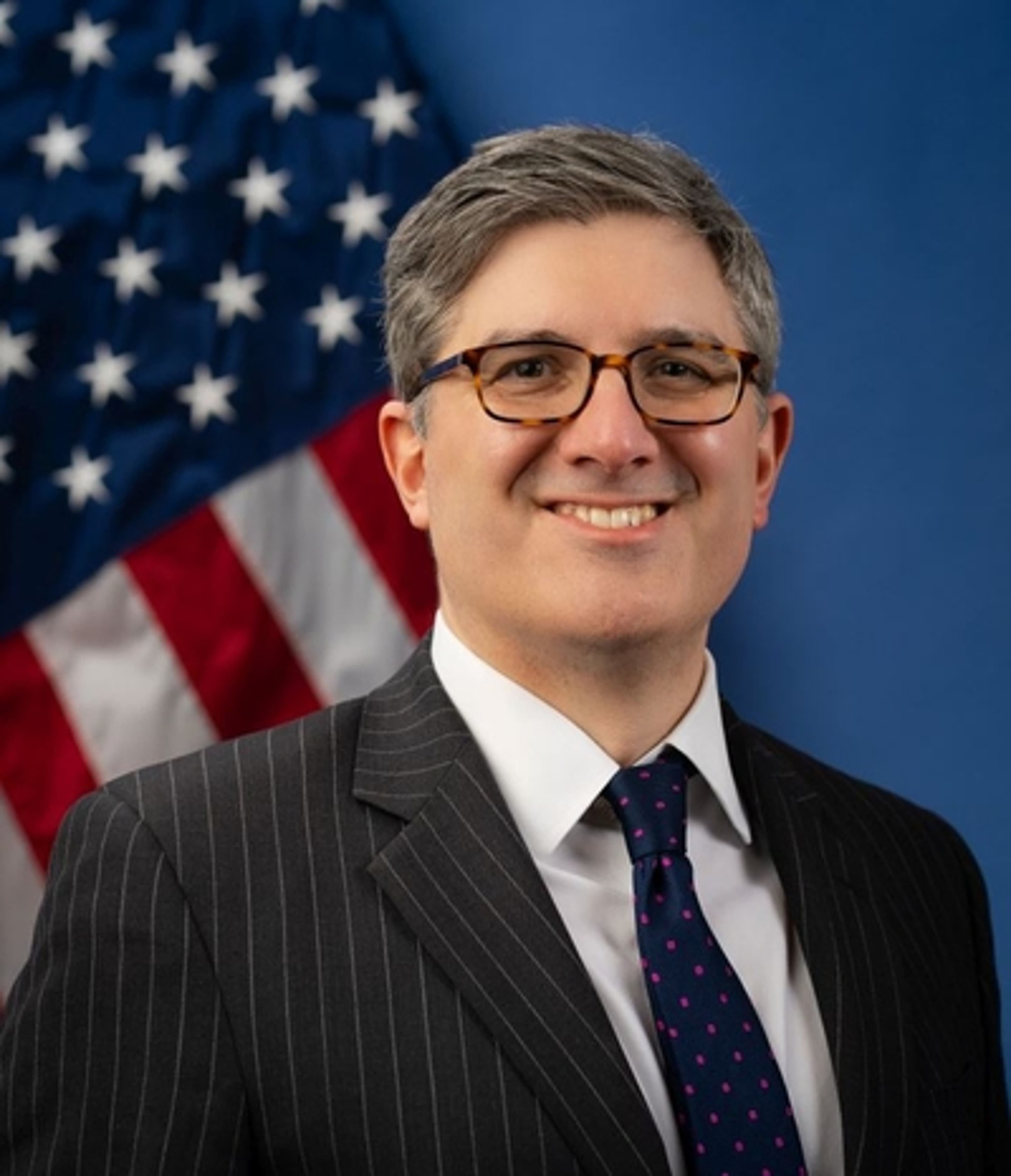 headshot of Alex Greenstein