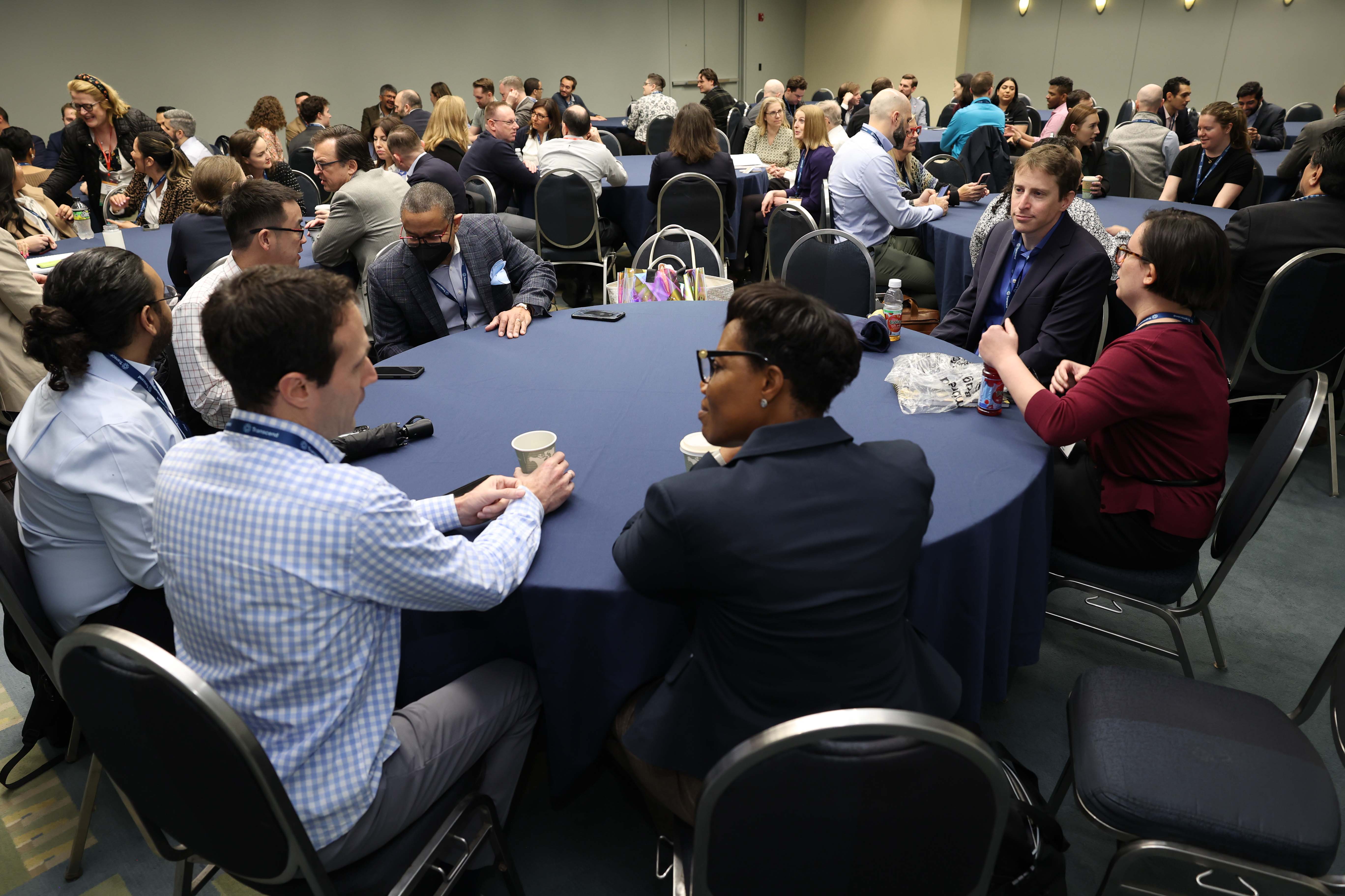 A table full of people conversing at a Privacy Bar section meetup