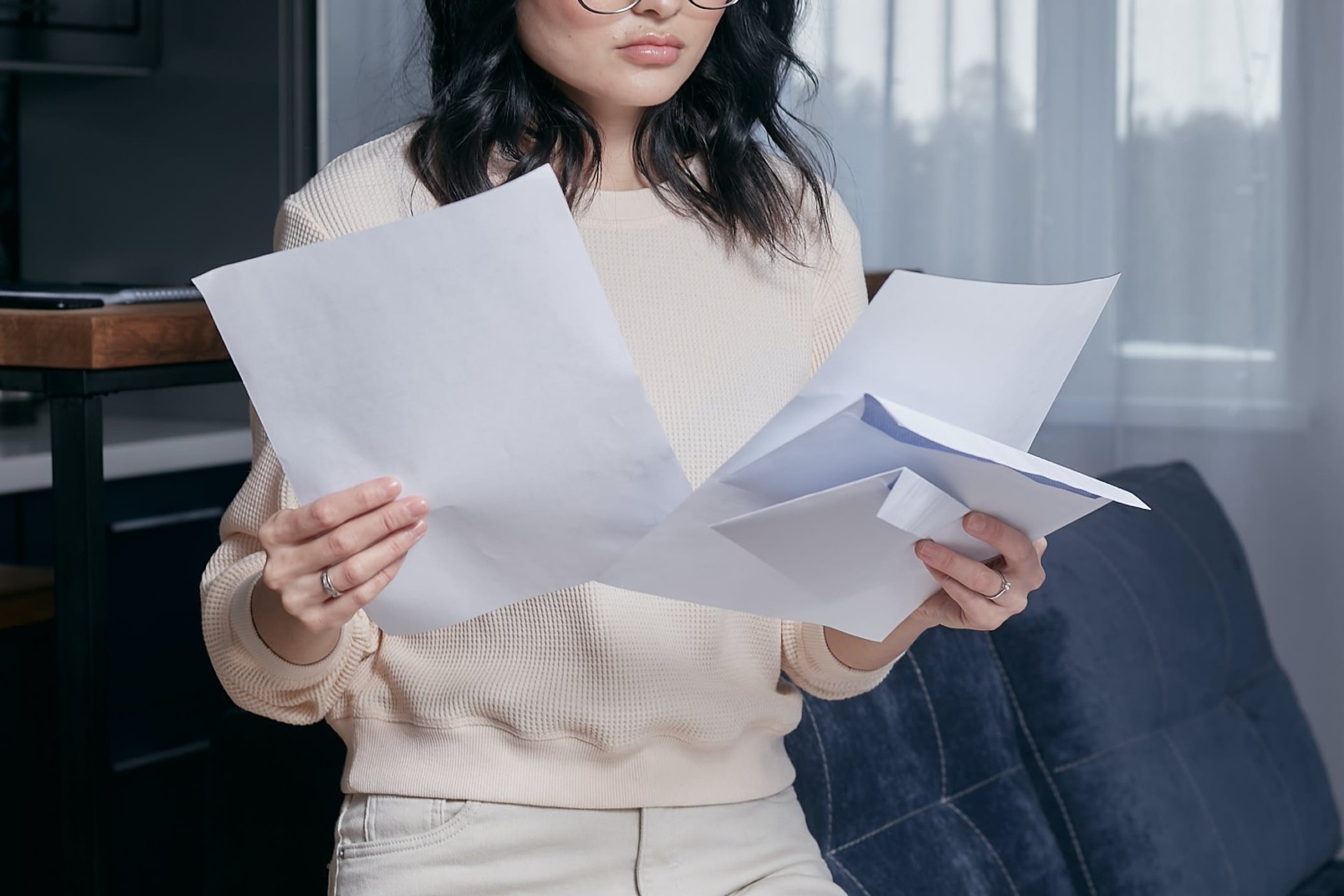 woman-holding-personal-documents-privacylaw-111423.jpg