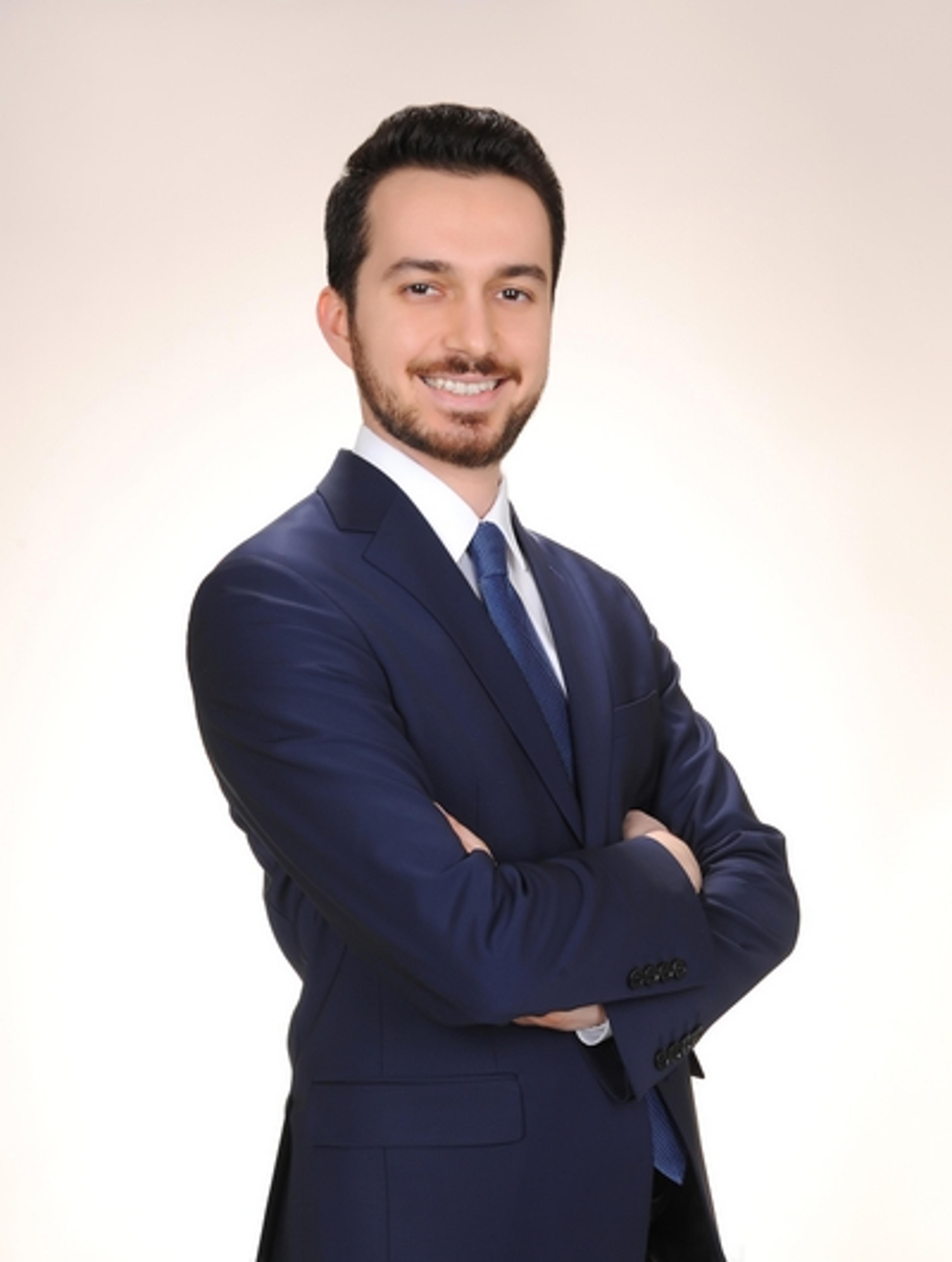 headshot of Süha USLU