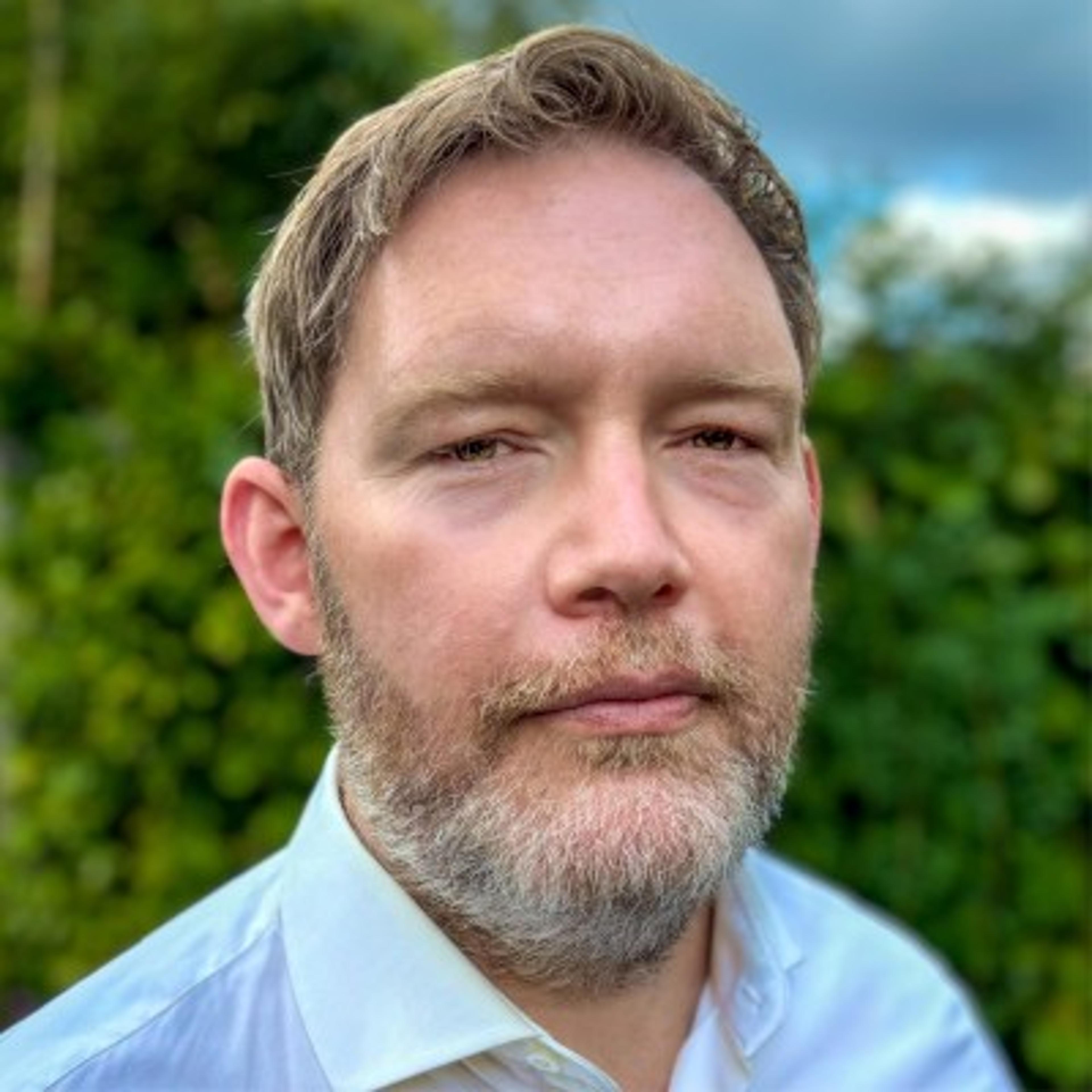 headshot of Andrew Harrison