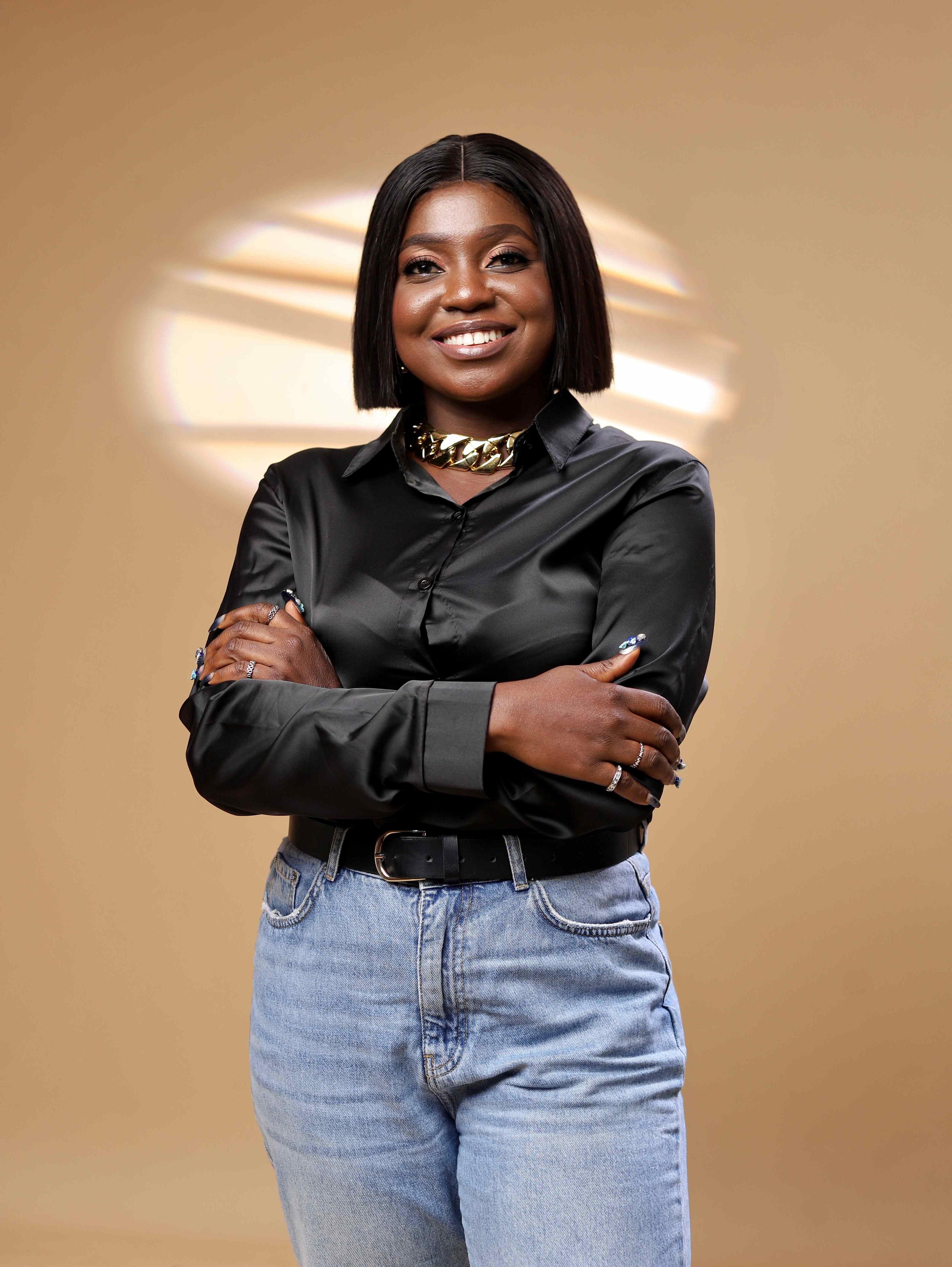 headshot of Morenikeji Dina