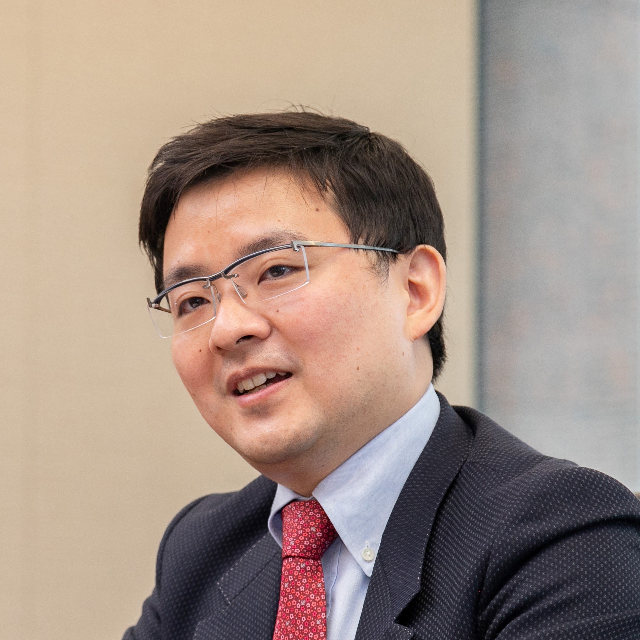 headshot of Atsushi Okada