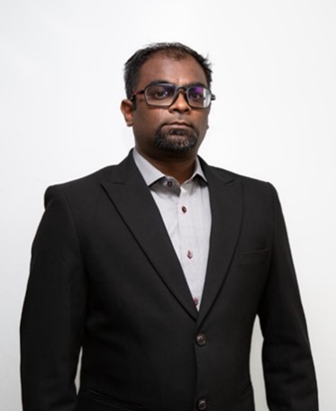 headshot of Denagharan Subramaniam
