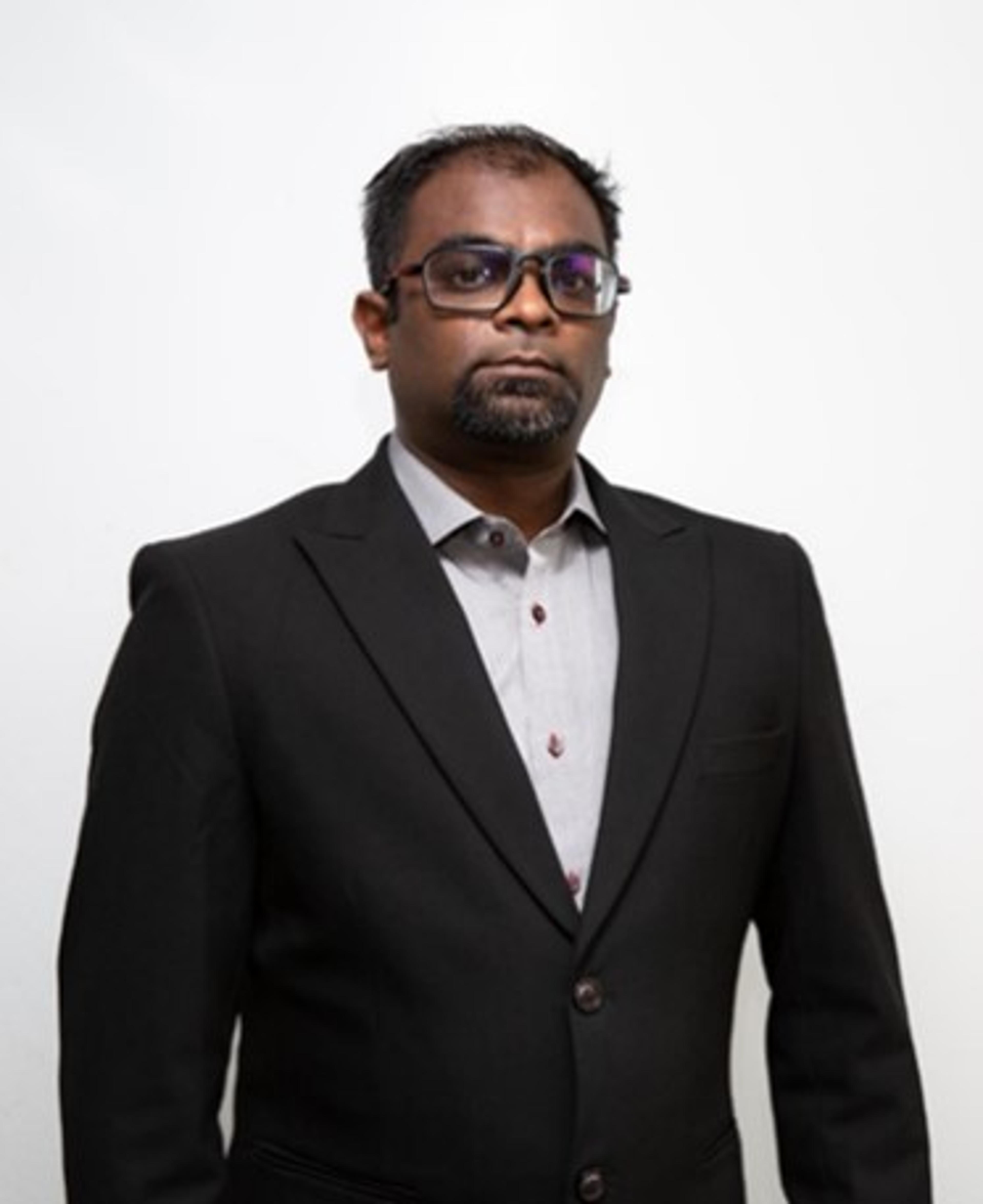 headshot of Denagharan Subramaniam