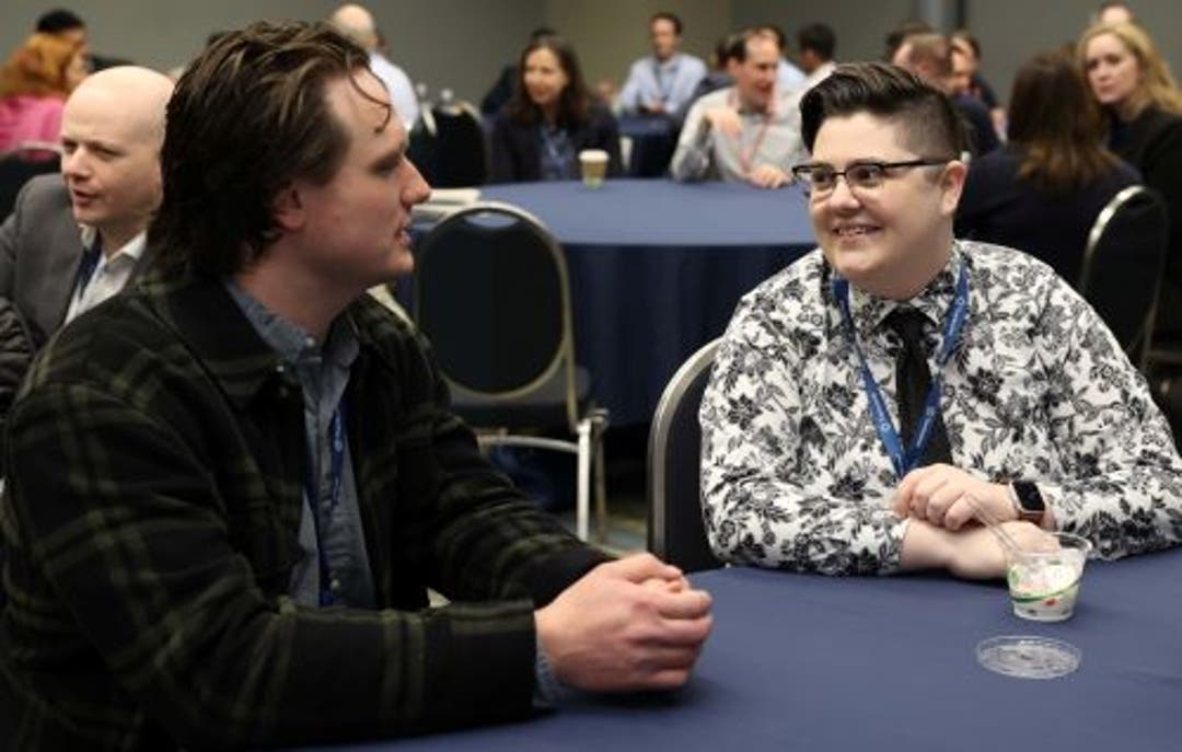 Two people talking at a Privacy Bar section meetup