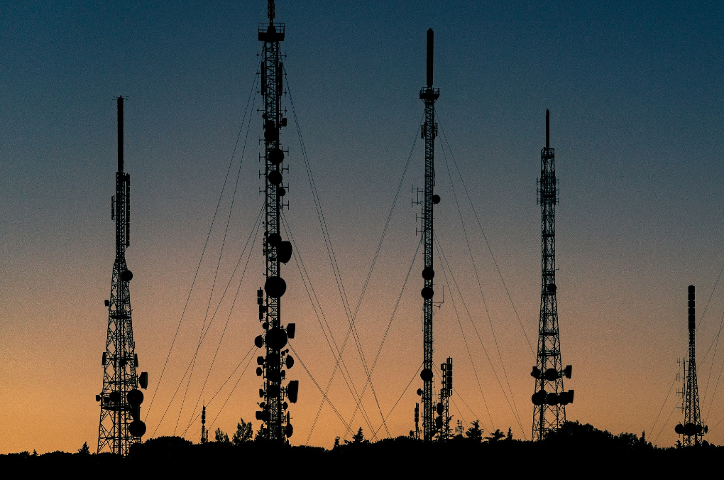 phone-towers-sunset-telecommunication.png