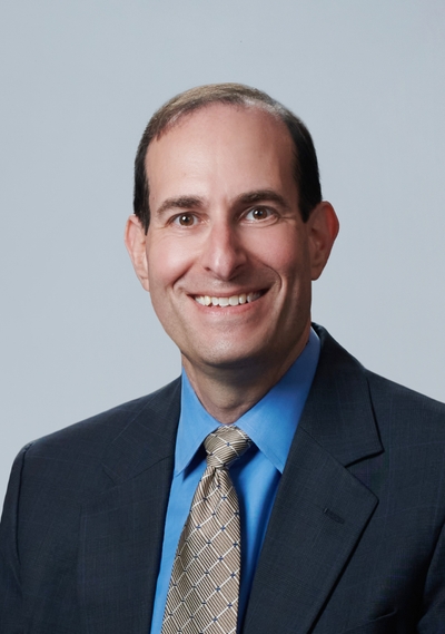 headshot of Adam Greene