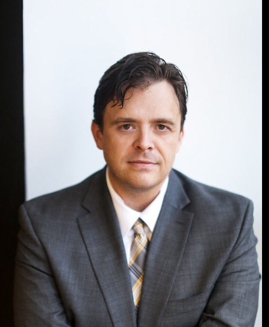 headshot of Adam Bagwell