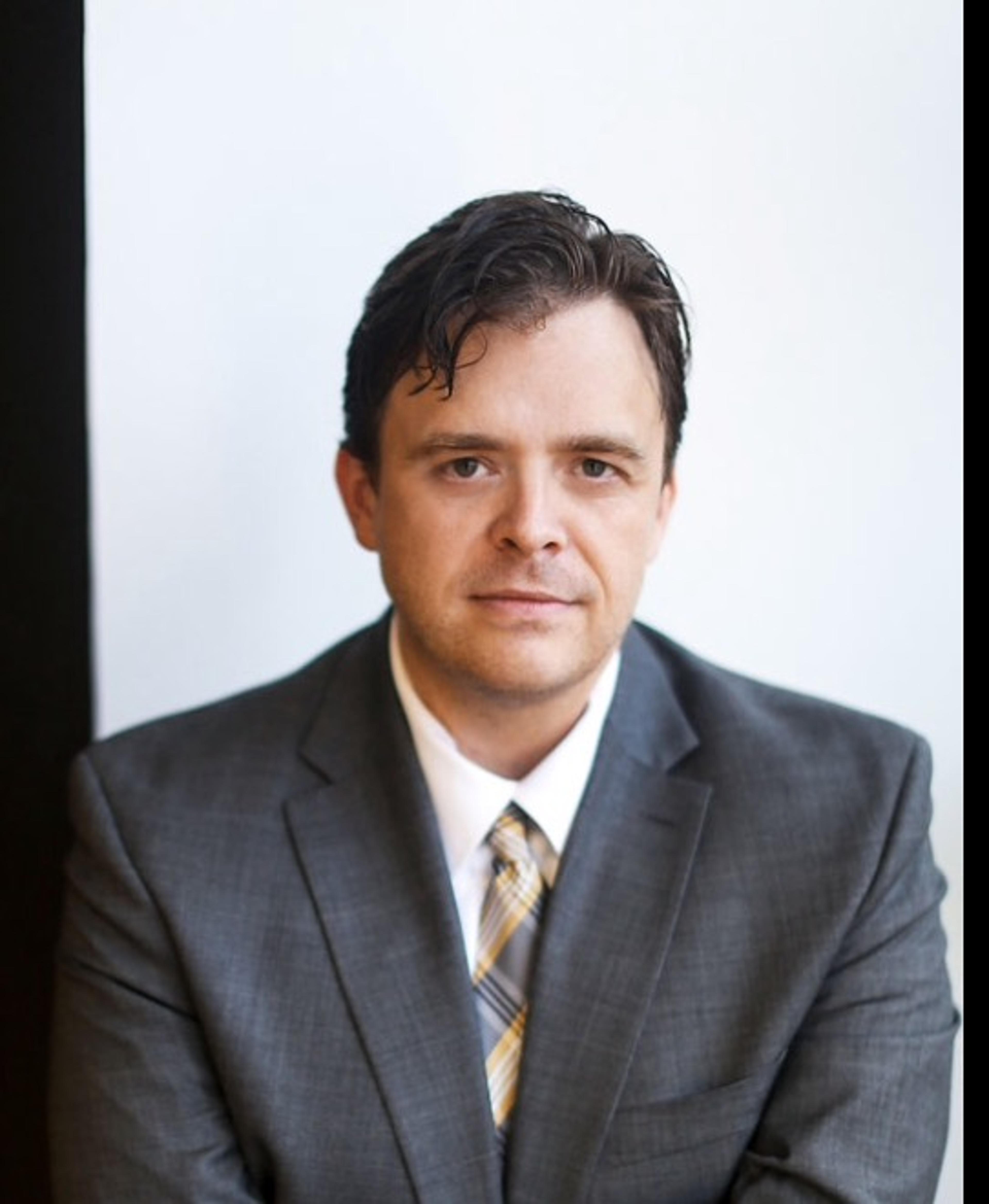 headshot of Adam Bagwell