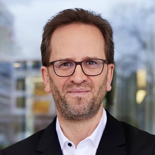 headshot of Klaus Müller