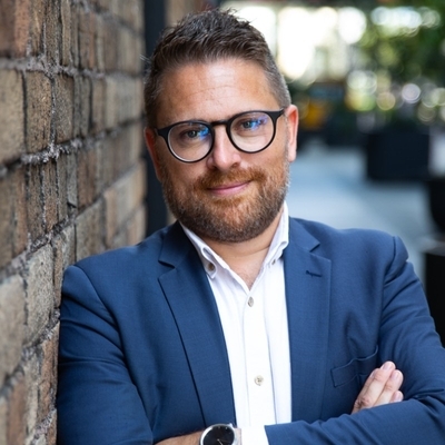 headshot of Daimhin Warner