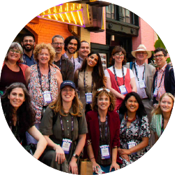 Image of a group of people standing together for a photo