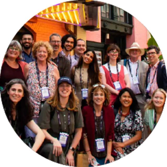 Image of a group of people standing together for a photo
