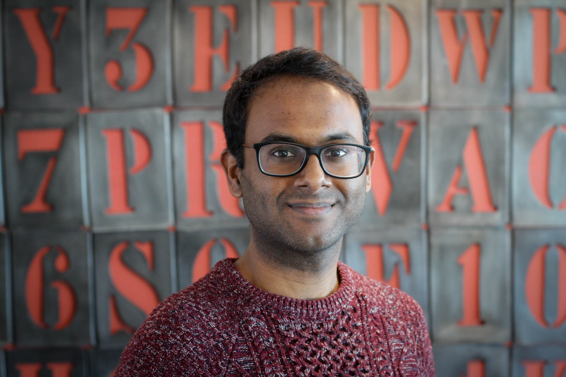 headshot of Saz Kanthasamy