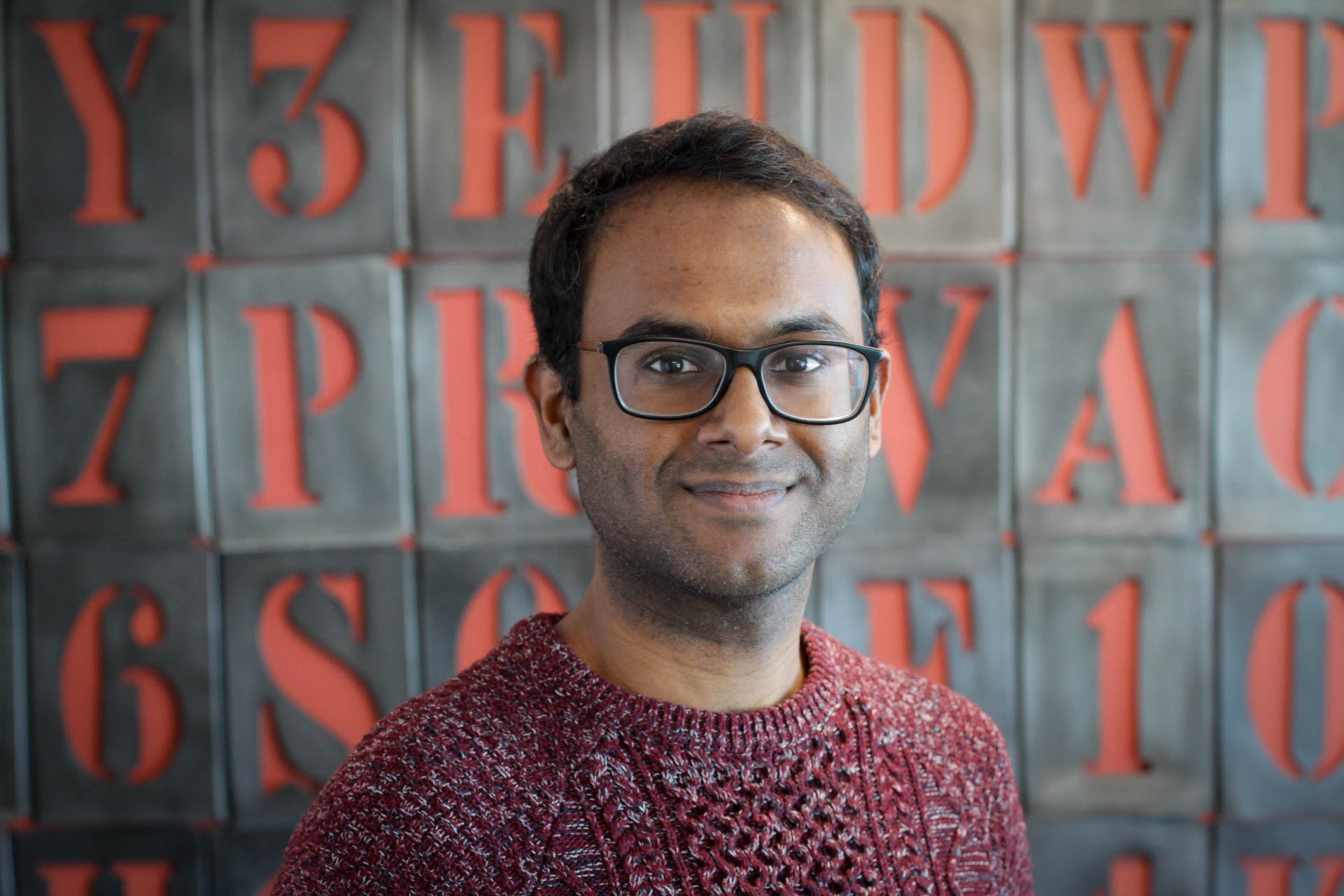 headshot of Saz Kanthasamy