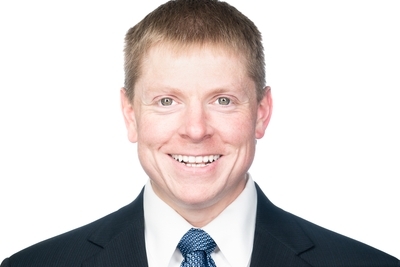 headshot of Corey Hlavacek