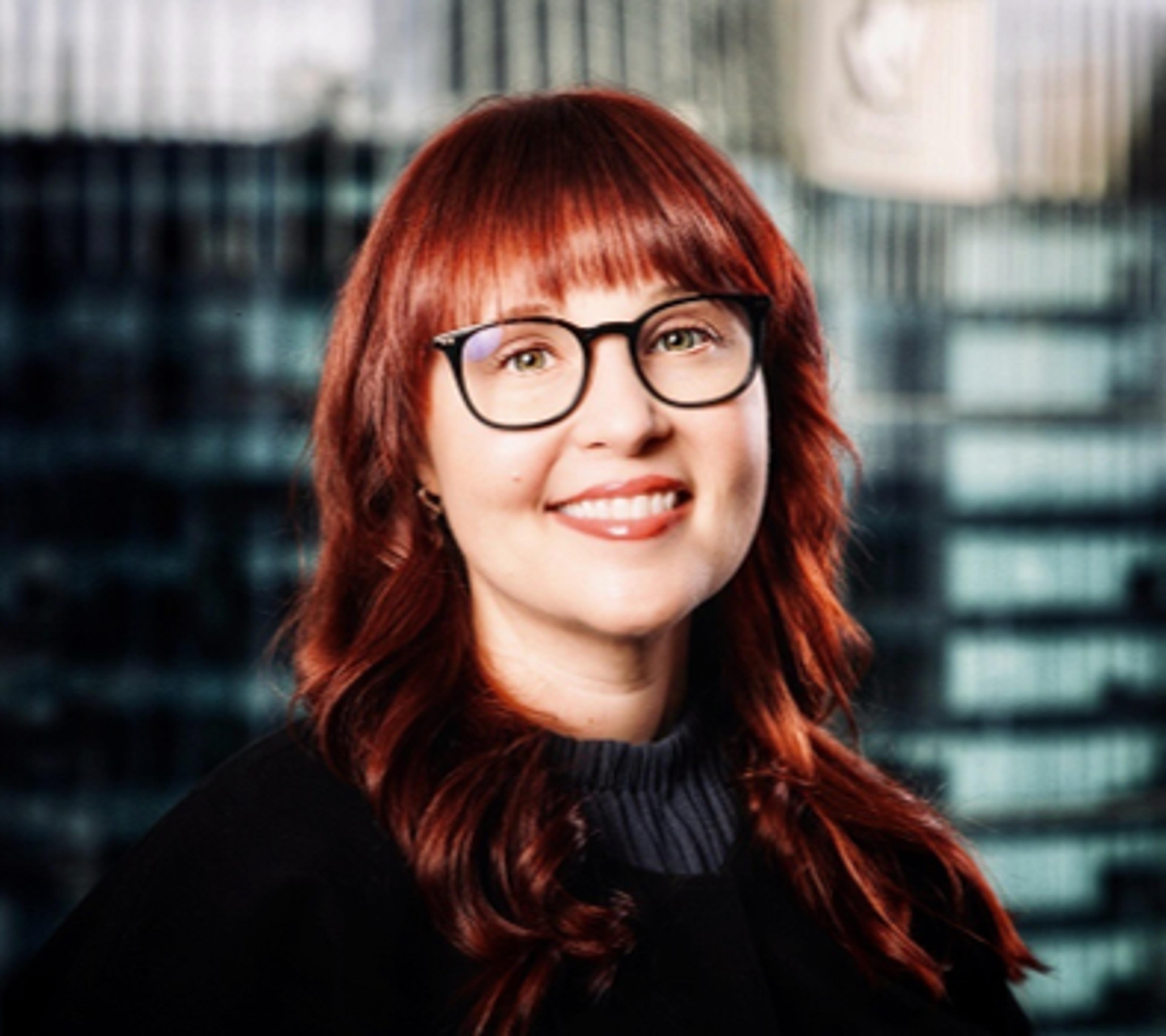 headshot of Christa Queern