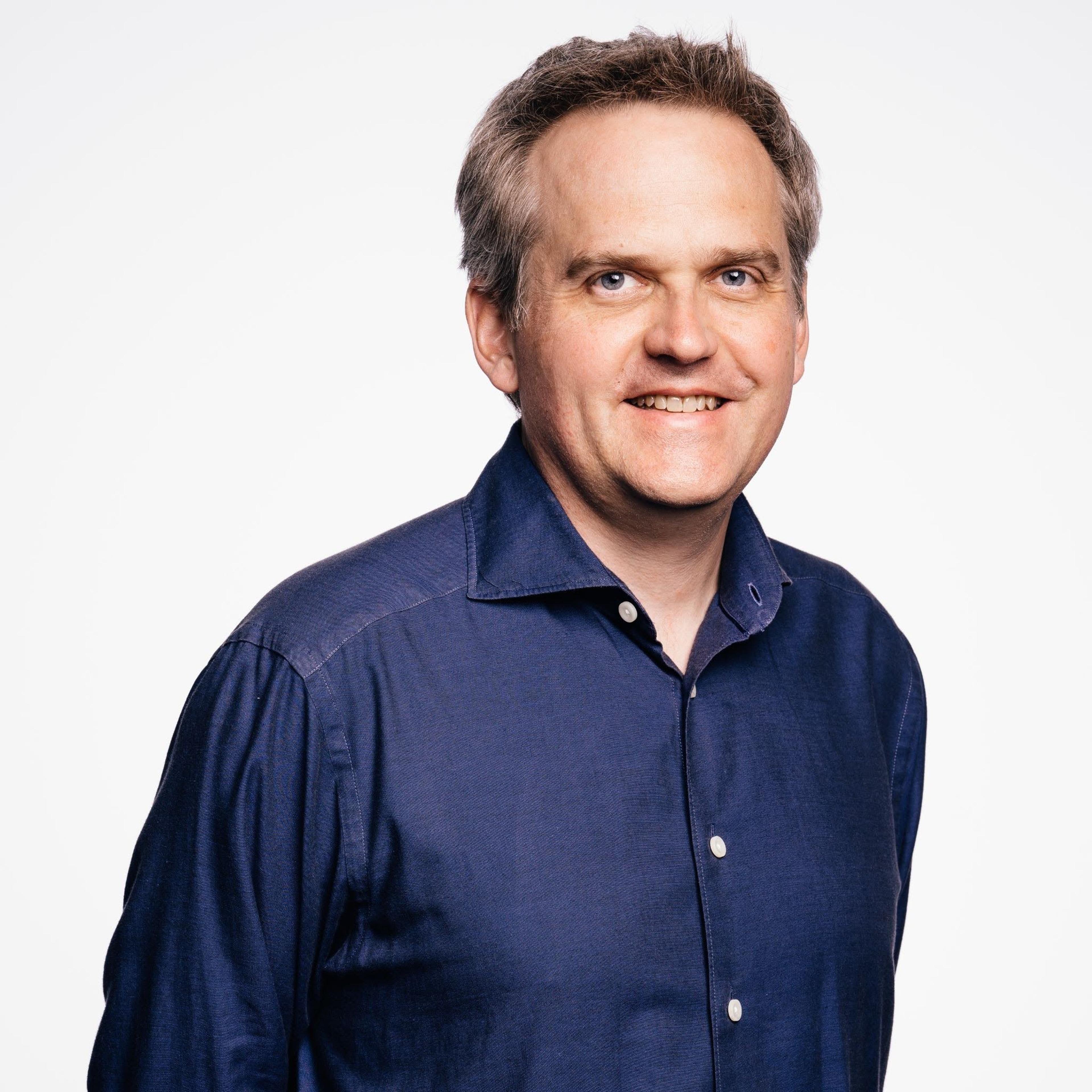 headshot of Michel Protti