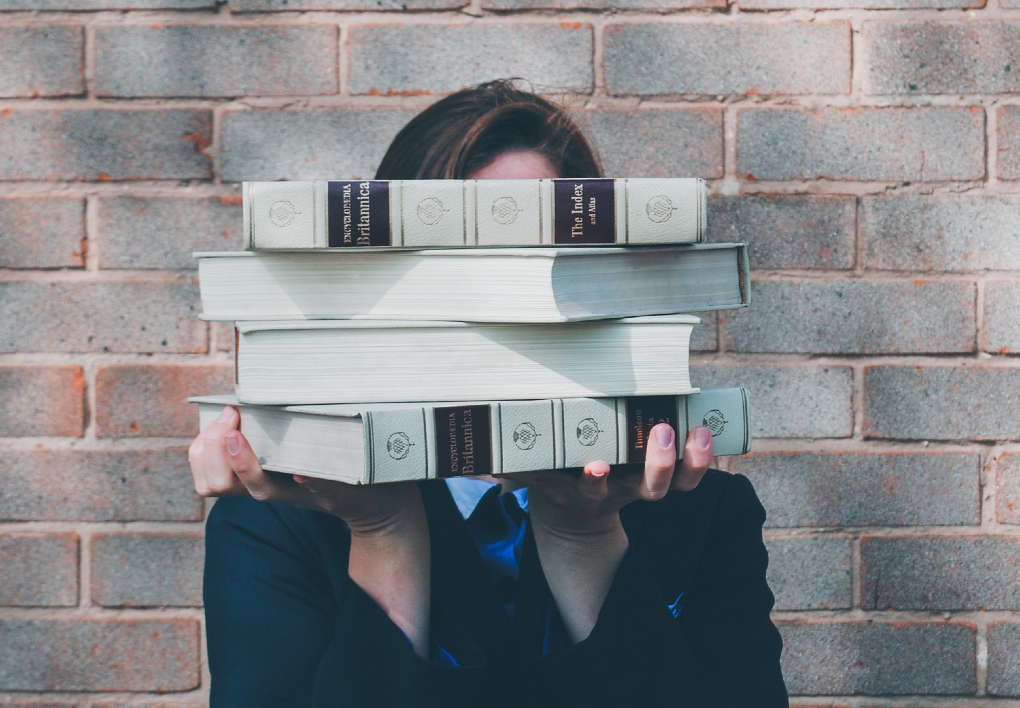 woman-behind-books-biometrics.png