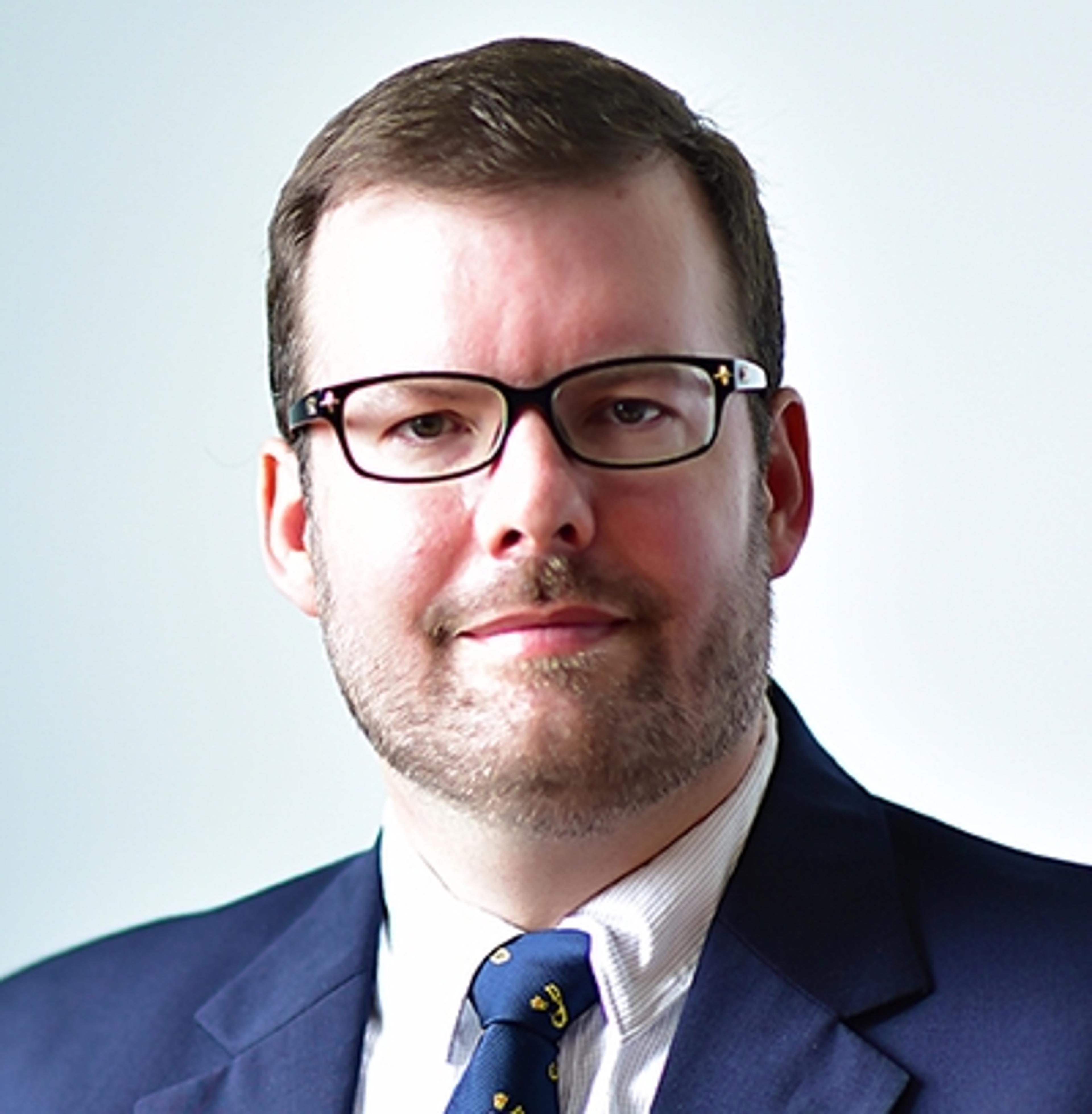 headshot of Alexander White