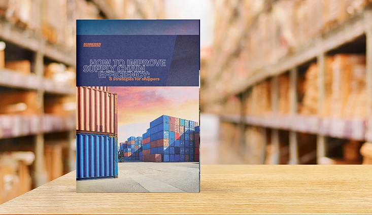 Guidebook propped up on wood surface inside a warehouse