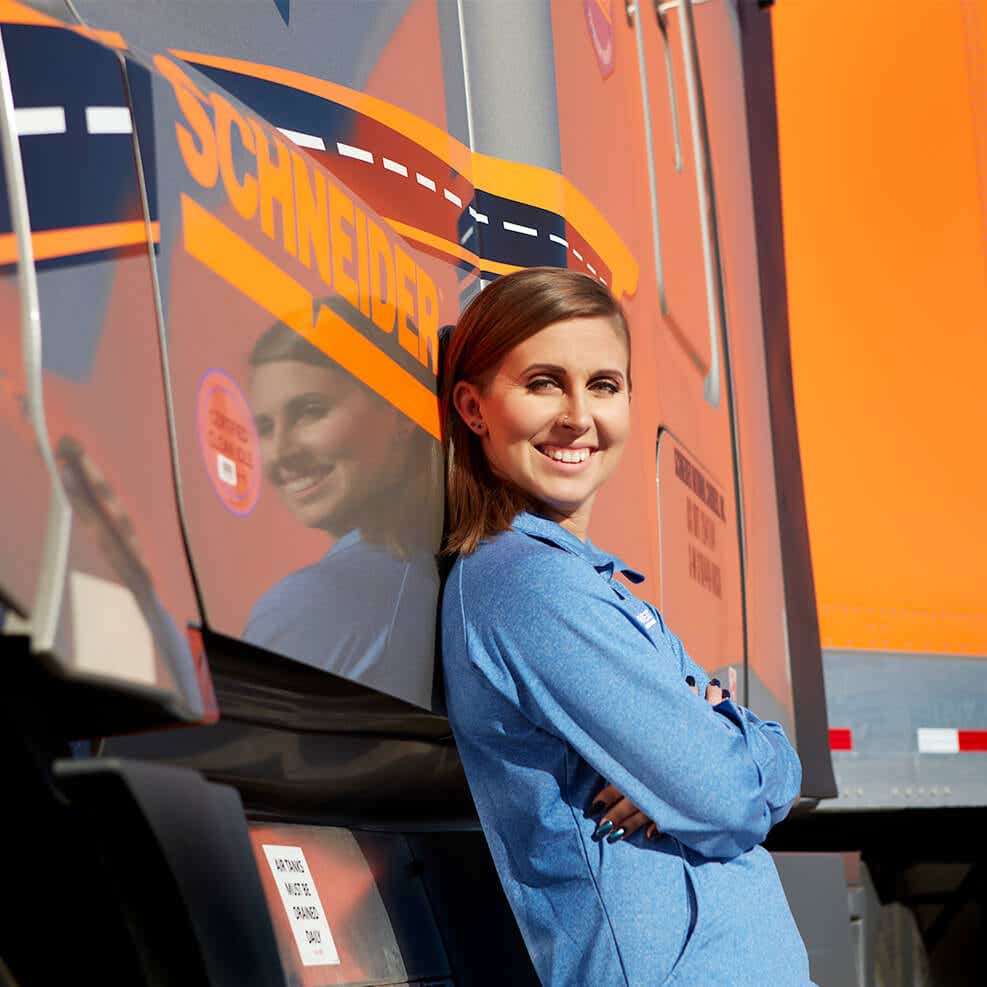 WIT Driver Ambassador, KayLeigh McCall poses next to her truck.