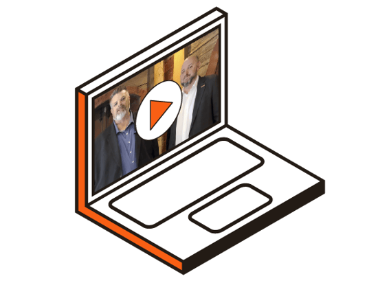 Opened laptop with video play button on screen