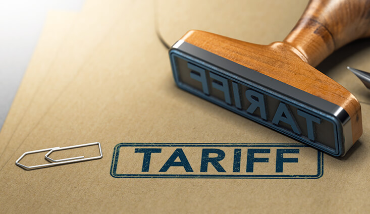 stamp on a brown folder with the word "tariff"