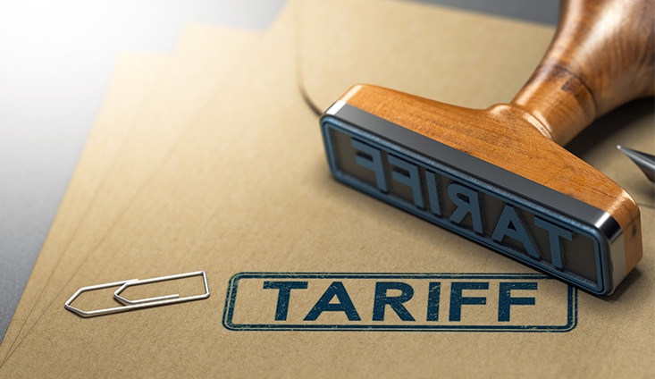 stamp on a brown folder with the word "tariff"