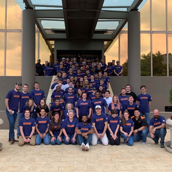 team photo of Schneider associates