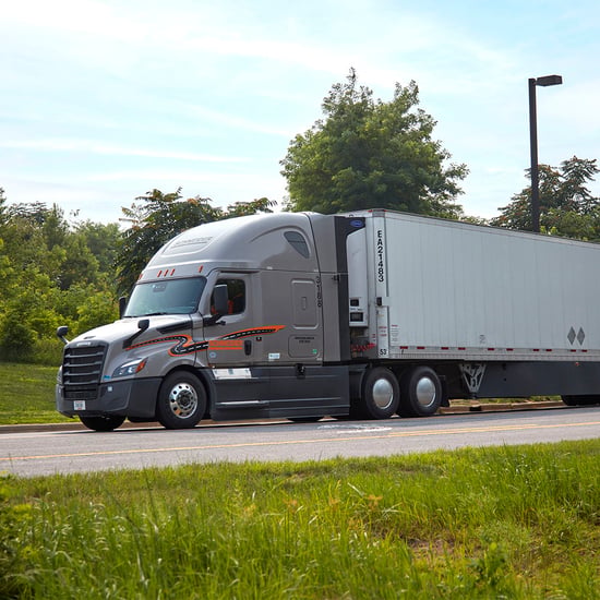 refrigerated semi truck on the road