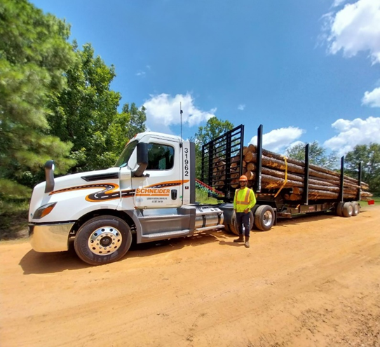 schneider hauling logs