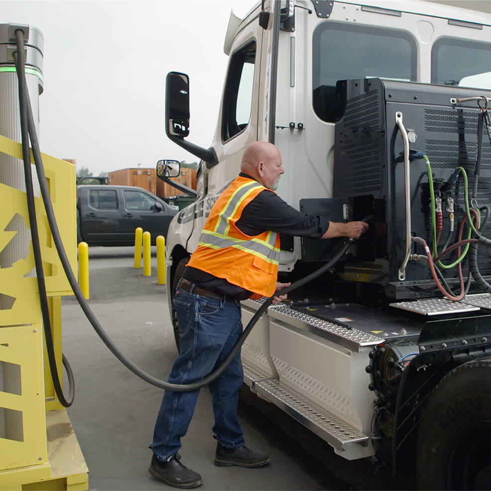 Electric truck being charged