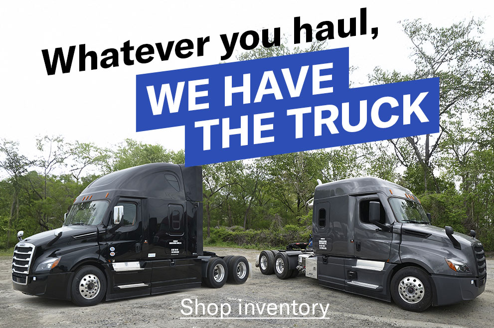 A 2025 VTL Freightliner and a 2025 Bulk Freightliner parked in a gravel parking lot with the words "Whatever you haul, we have the truck" placed over it and a "Shop inventory" link button.