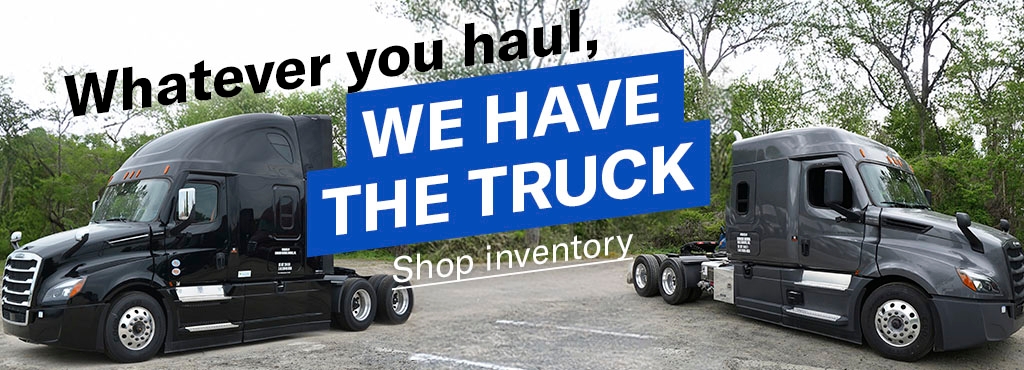 A 2025 VTL Freightliner and a 2025 Bulk Freightliner parked in a gravel parking lot with the words "Whatever you haul, we have the truck" placed over it and a "Shop inventory" link button.